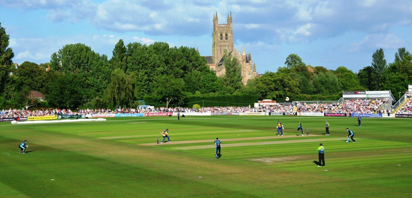 cricket match being played with back drop of Worcester cathedral